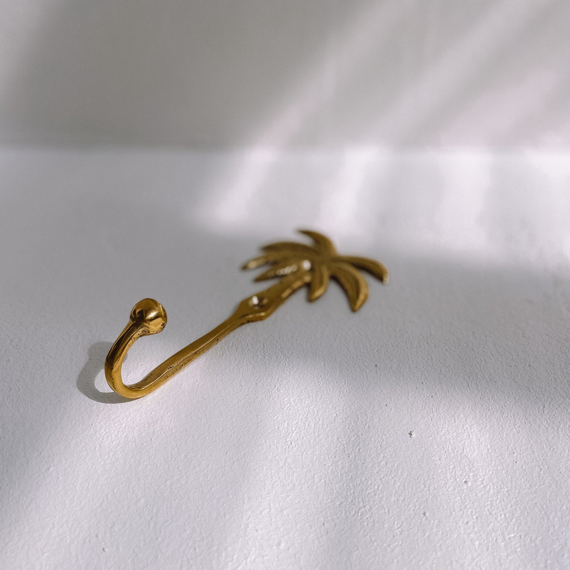 Brass palm tree wall hook